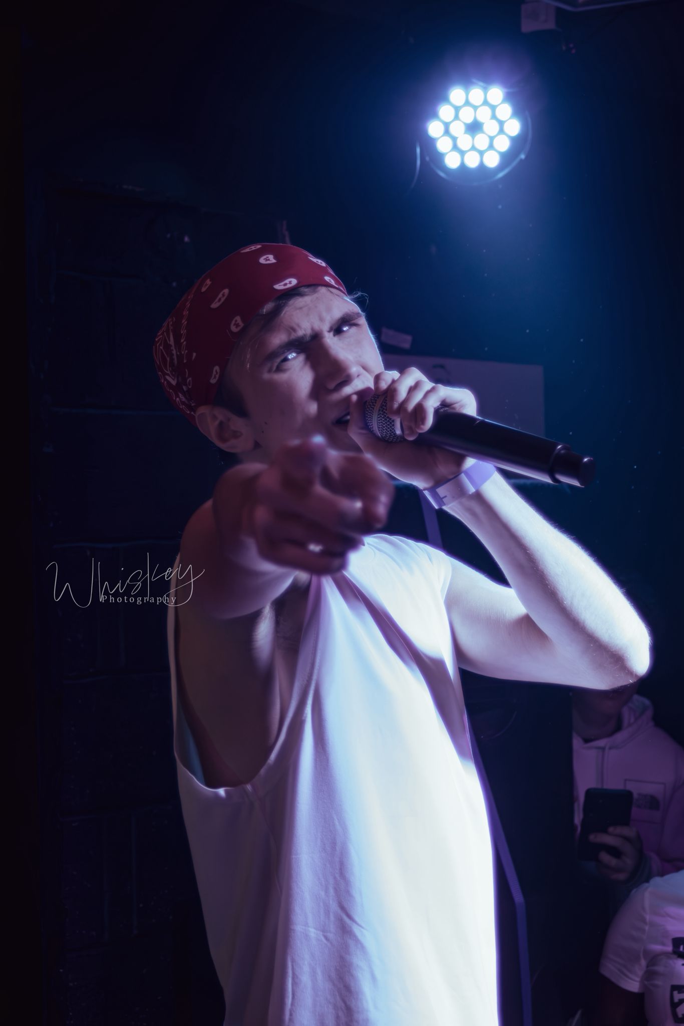 SHDE pointing at the camera